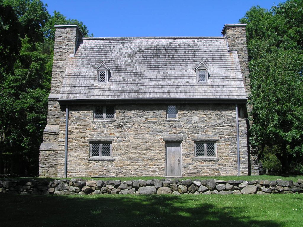 a picture of the henry whitfield state museum which is built with gray stones