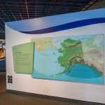 a large display with a map of alaska